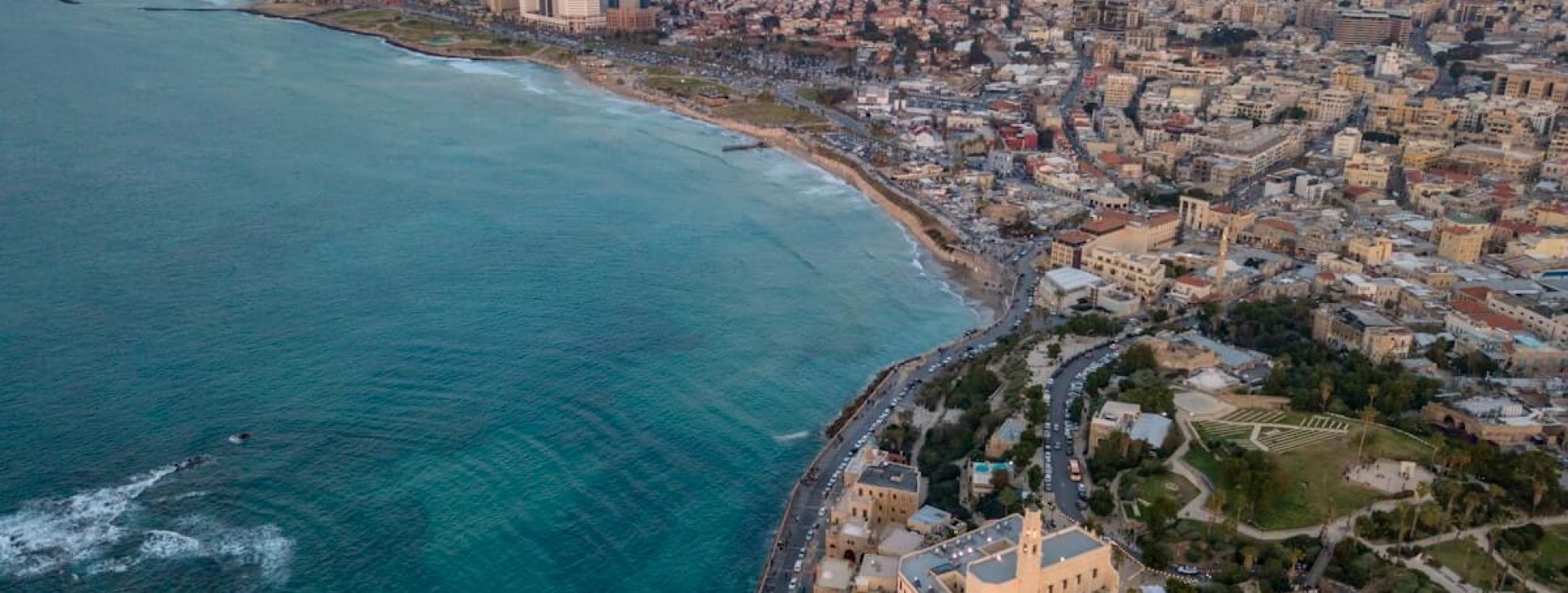 Aerial view of Tel Aviv city skyline and Mediterranean coastline for EOR in Tel Aviv startups